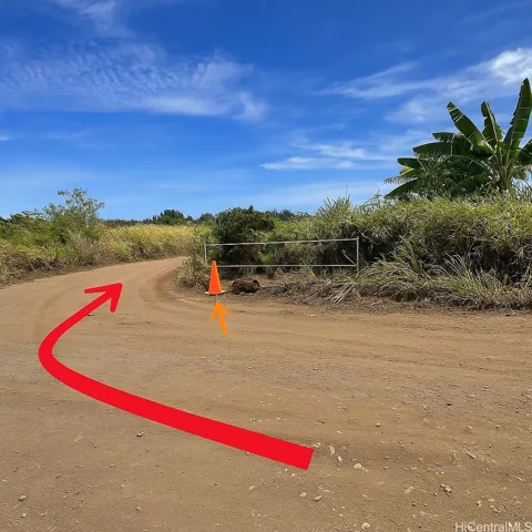 After Right Bend Turn Right here at Road marked with Orange Pylon - 2nd Lot on Right