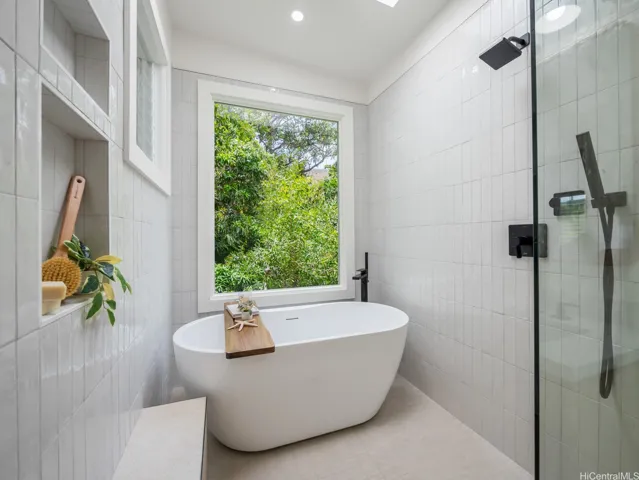 Who wouldn't enjoy soaking in this gorgeous soaking tub, immersed in nature...