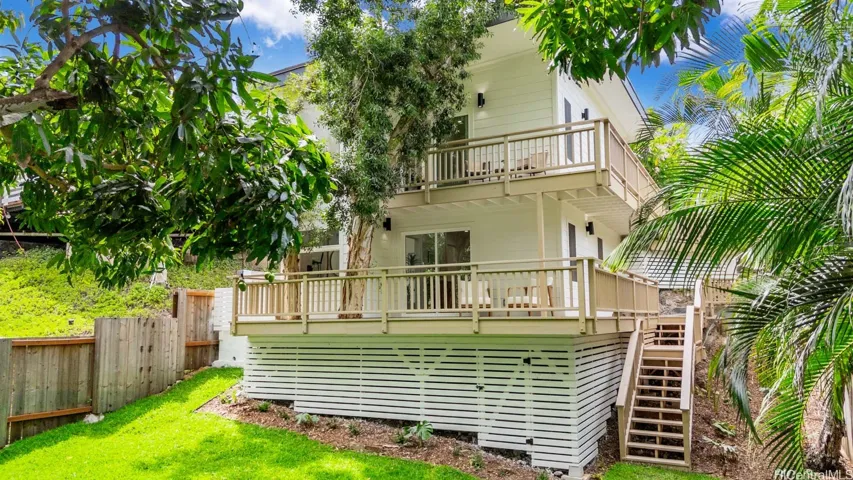 This home must be seen to be fully appreciated. Lanais wrap around the home so that each part is accessible from the others.