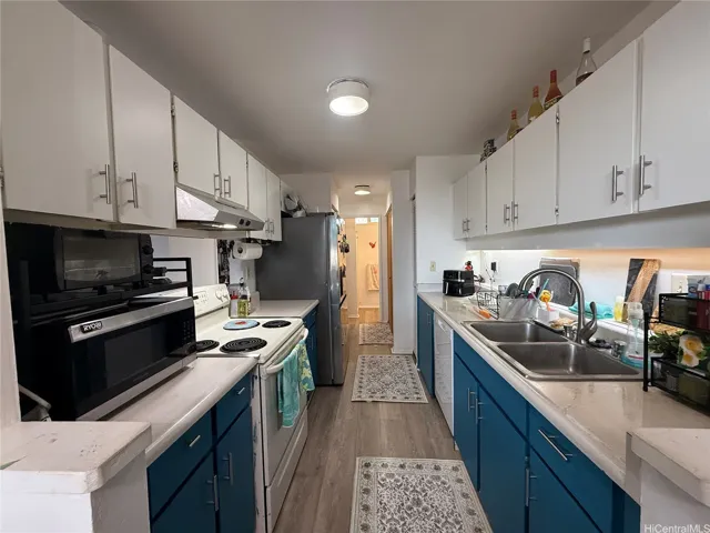 The kitchen leads to the washer/dryer and the full bathroom.