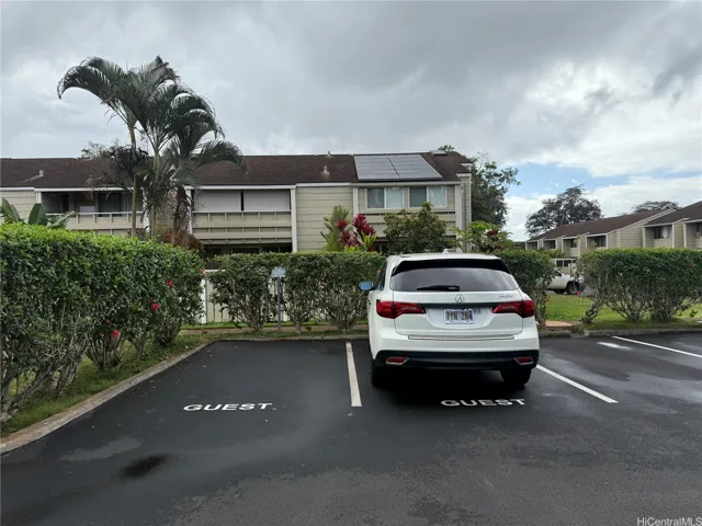 Guests parking nearby the house.