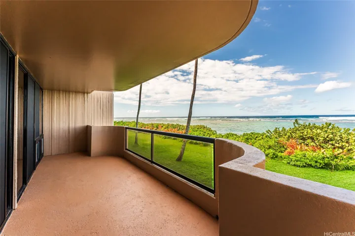 Ocean views from the covered lanai. You're just steps away from the beach.