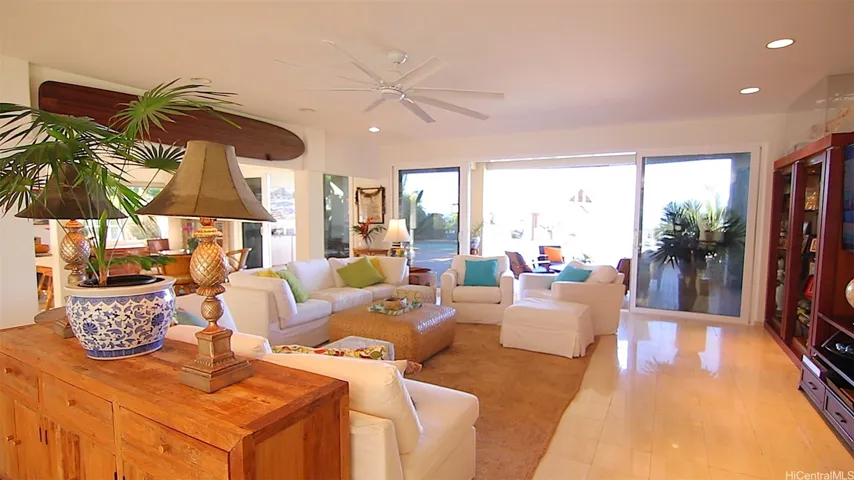 Open living area and huge lanai (in the flooded in light) with 2 shades that block the afternoon West sunlight.