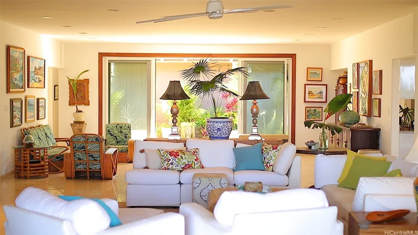 Enjoy Island style living the Hawaiian way, after all that's why we're living in our home in the islands!  This photo is facing the front door, gated entry area with adequate cameras coverage and walled and fenced in for (Non-needed) security and dogs.  Planted ADA area is great for those who need it as well as bringing in food from shopping off the stationary ramp.