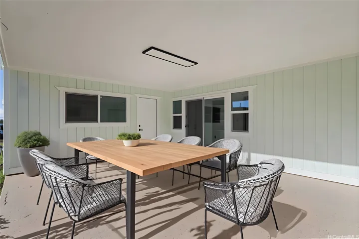 Enhanced photo of patio virtually staged. Great for entertaining!