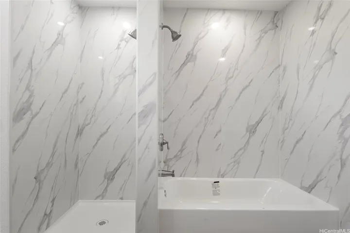 tub AND shower in the hallway bathroom