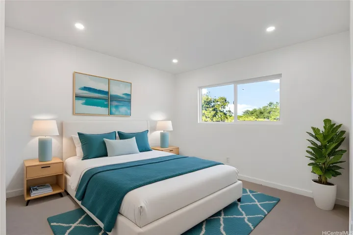 Enhanced photo of primary upstairs bedroom with virtual staging.