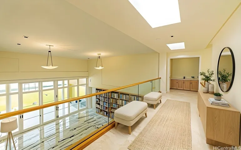 Upper landing with loft seating area.  Enhanced