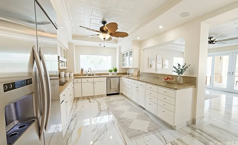 Chef's kitchen with stainless appliances and large island. Enhanced.