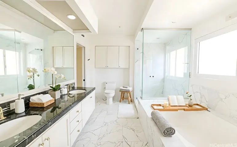 Spa-inspired bathroom with dual vanities. Enhanced.