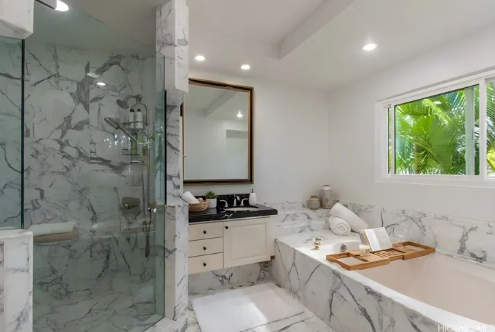 Primary bathroom with walk-in shower and soaking tub. Enhanced.