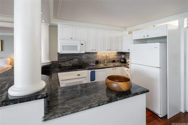 Tons of counter space, functional and updated.