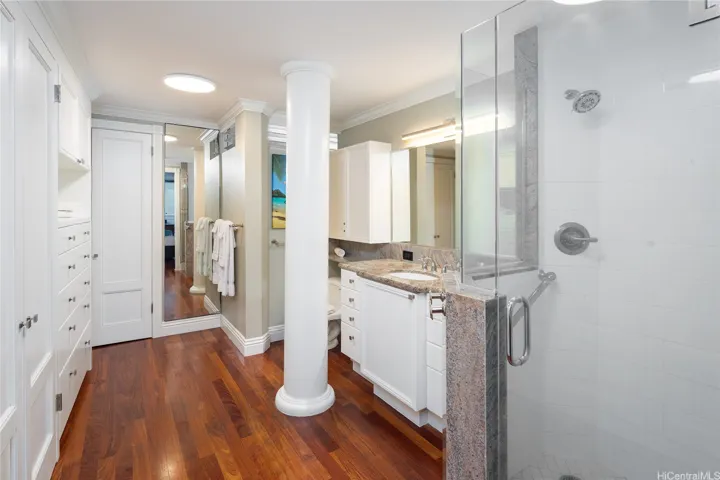 Primary en suite bathroom with walk-in shower.