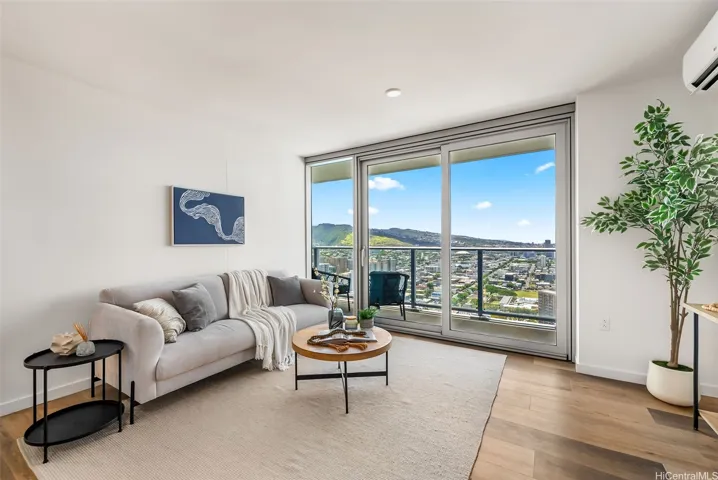 Floor to ceiling windows, open floor plan.
