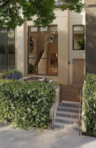 Inviting private entrance with hedges that provide space to relax or enter your residence.