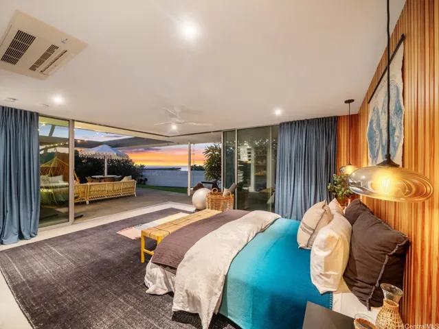 The primary bedroom opens to sweeping views.