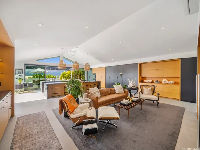 A spacious family room enhanced by stunning, built-in cabinetry throughout.
