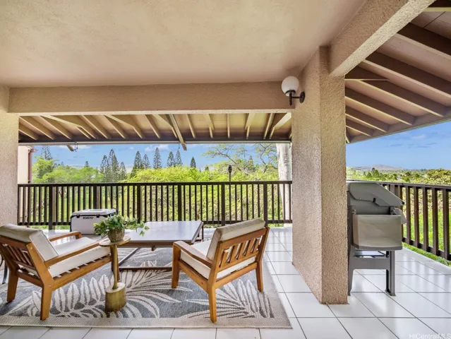 Large and breezy covered lanai just off the kitchen