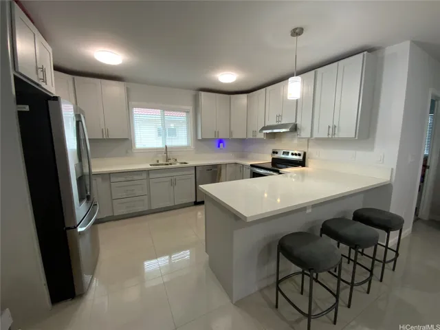 Full kitchen upstairs.
