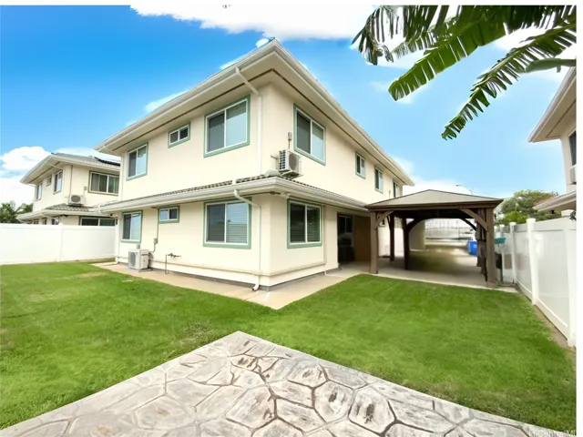 Spacious backyard with ample room for outdoor living.
