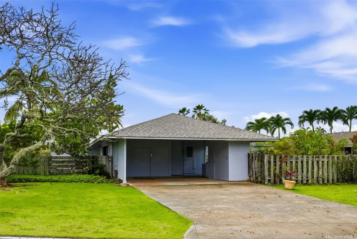 The 2 car carport includes 3 storage closets for your beach toys and an outdoor sink. The side yard has room to park your boat!