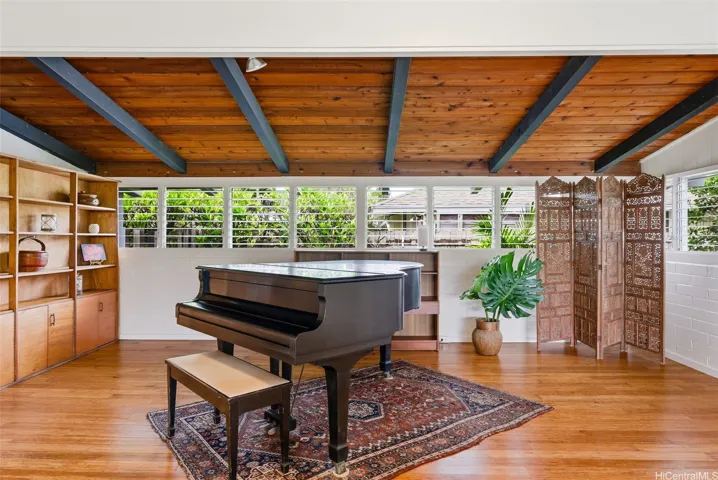 Jalousie windows bring in light and airflow.