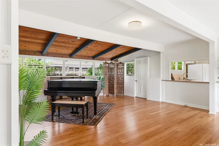 Pass through to the kitchen and a door to the backyard.