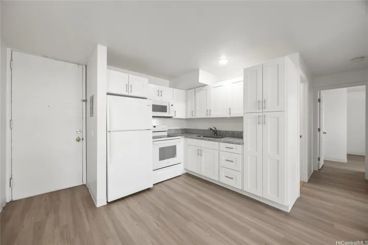 2BR/1BA: Updated kitchen and vinyl flooring.