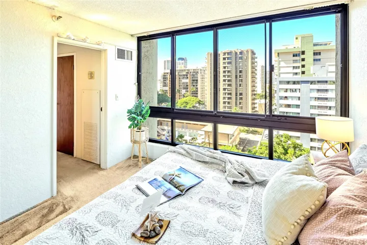 Bedroom has the large window