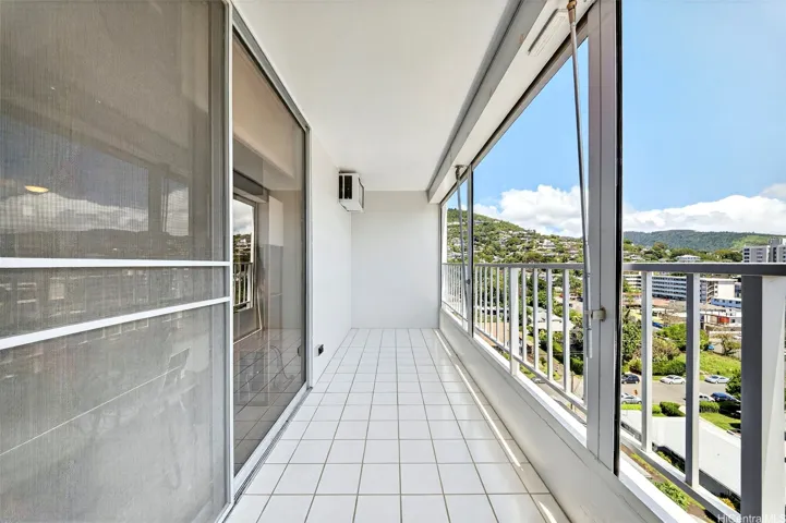 Covered lanai with hurricane shutters to protect from the elements
