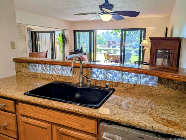 Kitchen looking out over the living to garden