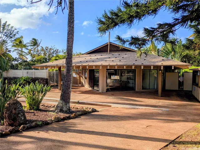 Just across the parking lot sits the condo pool and community room