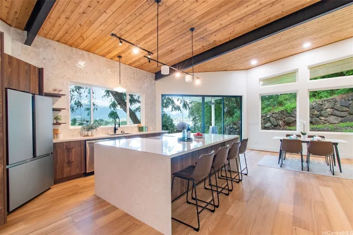 Magnificent Quartz waterfall island and countertops throughout the home