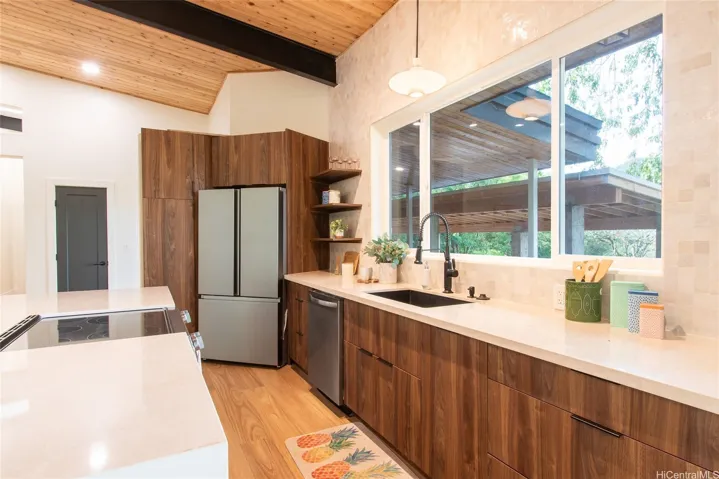 Immense amount of cabinet space with an easy pull out waste bin embedded within