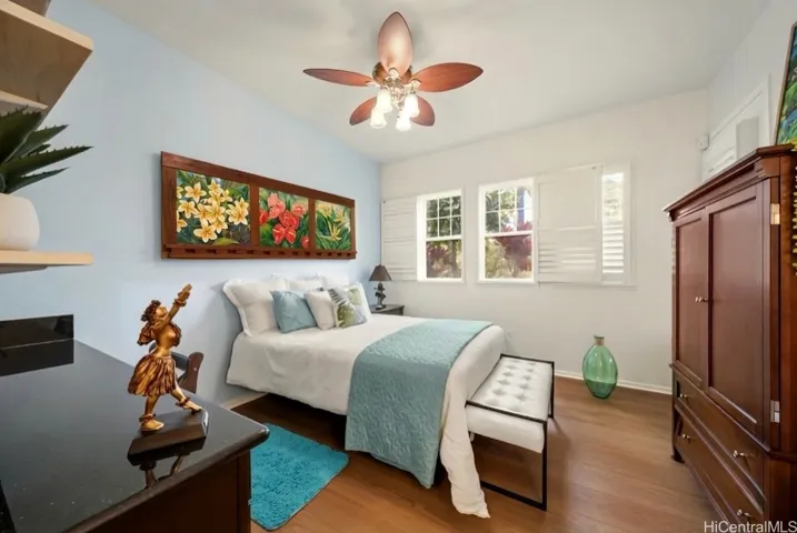 Primary suite with plantation shutters and breathtaking views of manicured and tropical landscape. Newly renovated Luxury Plank Flooring in both bedrooms.