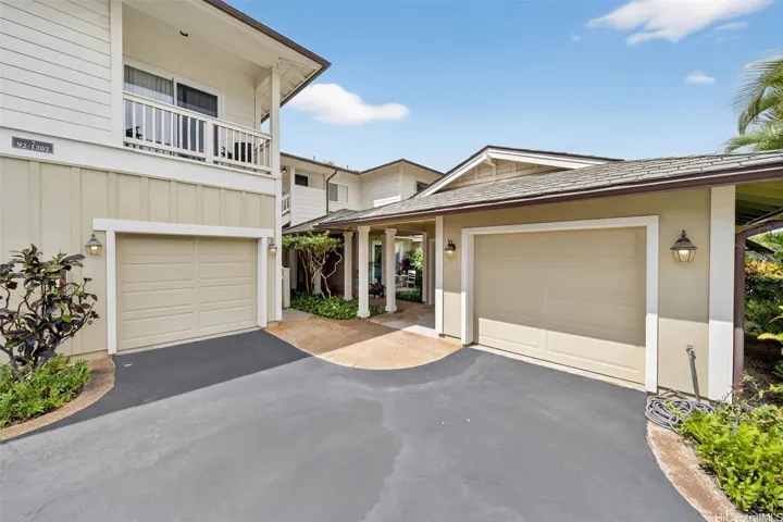 Floor unit, go through that walkway (to the left of the garages) that leads to your heavenly oasis. Enjoy a single car and a golf cart garage. Optional: two street assigned parking in front of the unit and mailbox.
