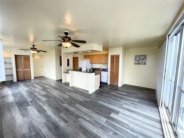 From back to front door and looking at kitchen