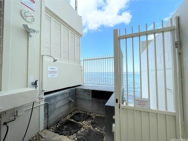 Shower area outside of building to ocean
