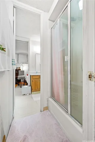 Shower is accessible from both bedrooms.