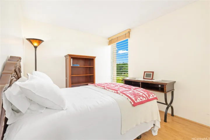 hall bedroom, nice size with plenty of natural light.