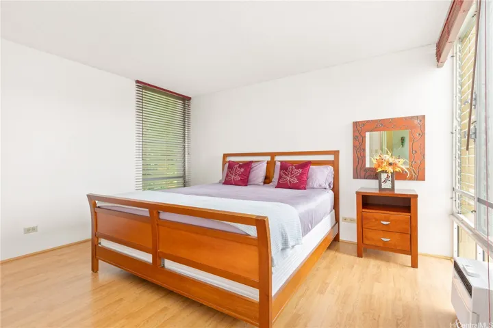 Primary bedroom. Only the end units have windows on both sides of the room allowing for cross ventilation.