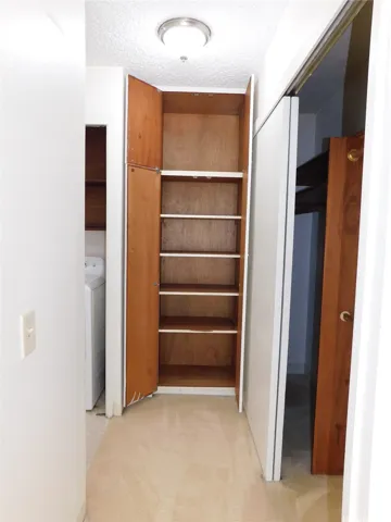 Built in shelves next to the first closet