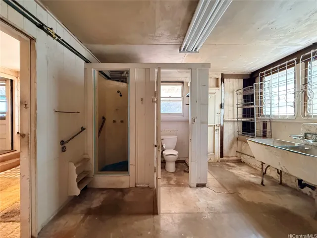 Lower level additional shower and toilet, exterior door