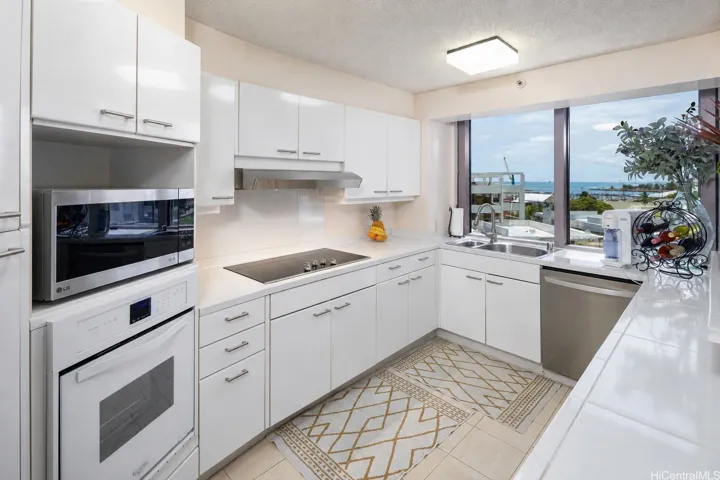 Large kitchen where you can watch the ships coming into the harbor from your kitchen window. (enhanced photo)