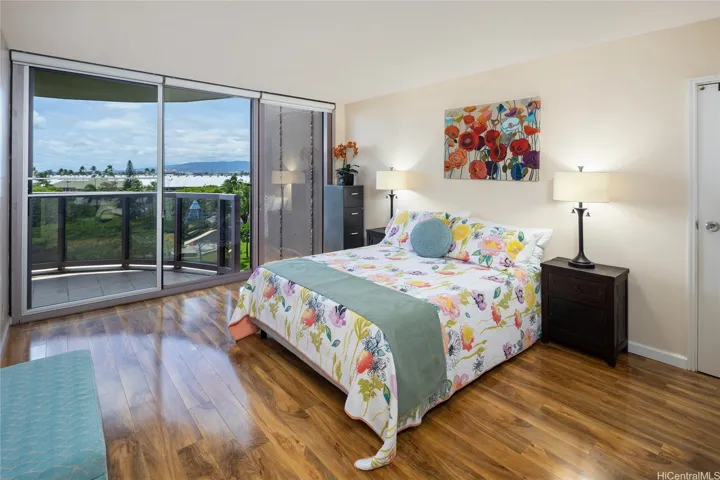 Primary bedroom that also has direct access to the lanai. Enhanced photo.