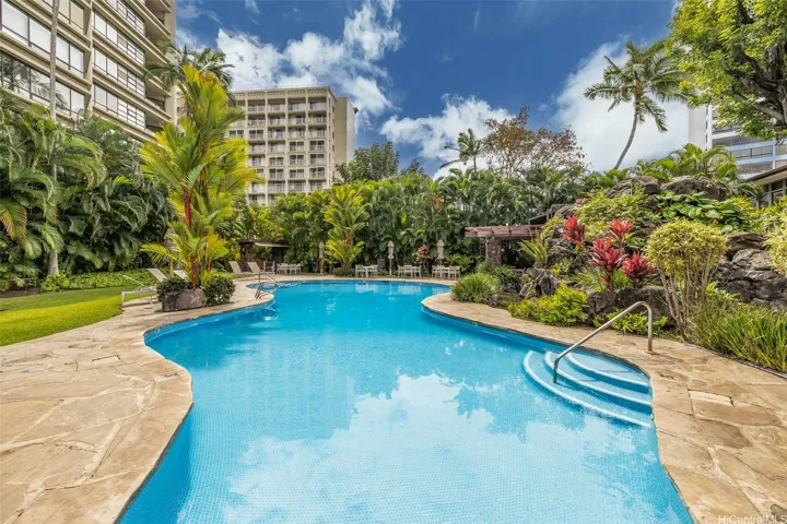 The lagoon shaped Pool, Spa, Cabana with BBQ areas, and spacious lawns are amazing!