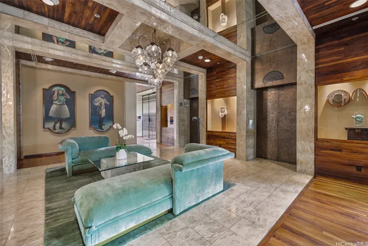 Elegant locked lobby features beautiful artwork and rich Koa finishes/