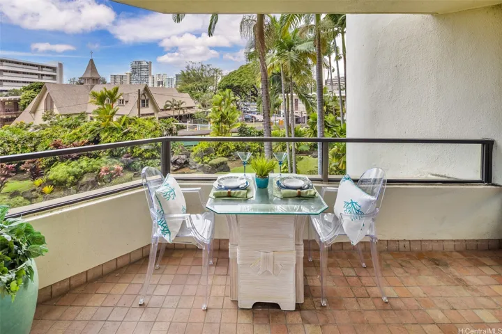 The covered lanai is perfect for dining or lounging.