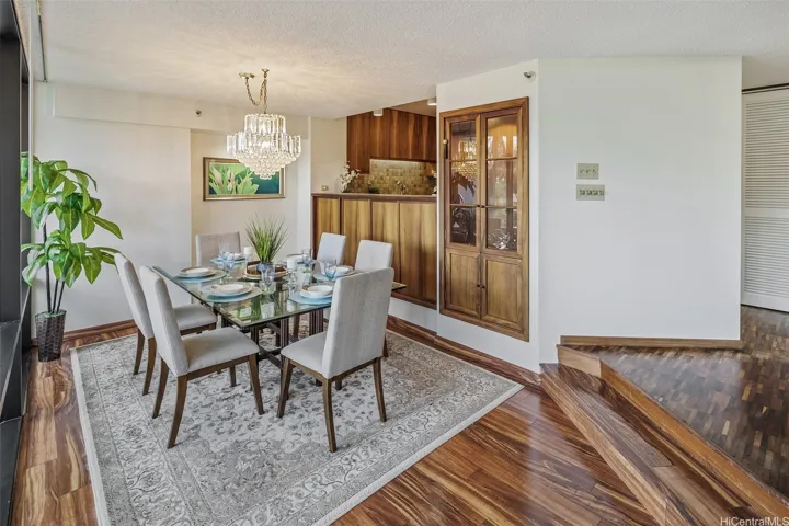Dining area features built-in amazing Koa wood cabinets.
