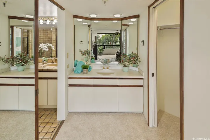 Dressing area and walk-in closet of the Primary Bedroom.
